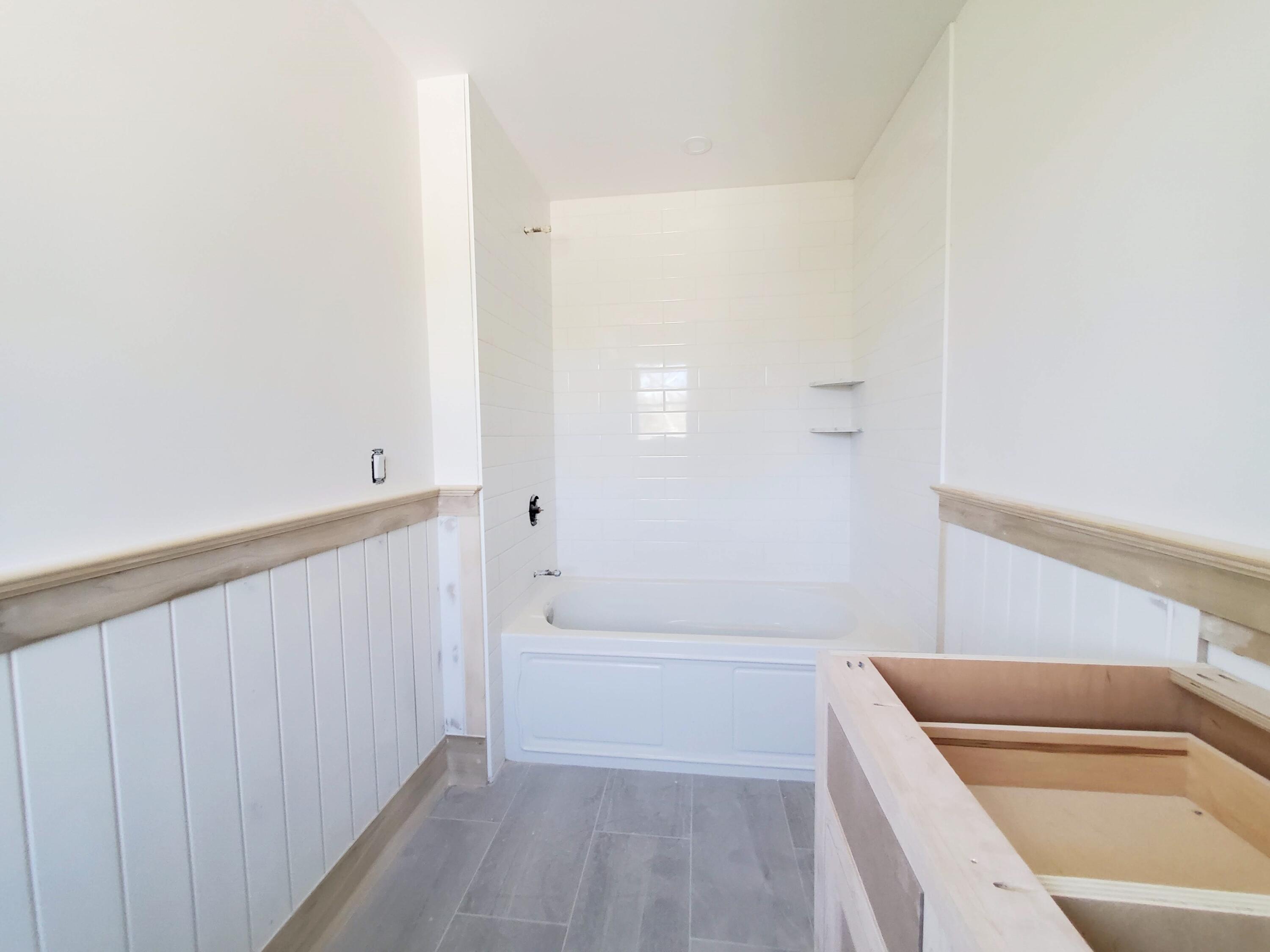 3 Snow Way Orleans, MA 02653 - Photo 22 of 33 a bathroom with a bathtub and shower