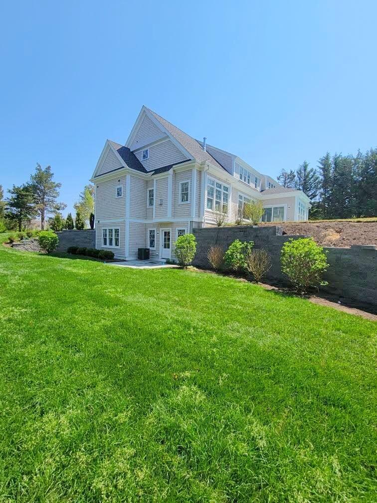 3 Snow Way Orleans, MA 02653 - Photo 29 of 33 a front view of a house with garden