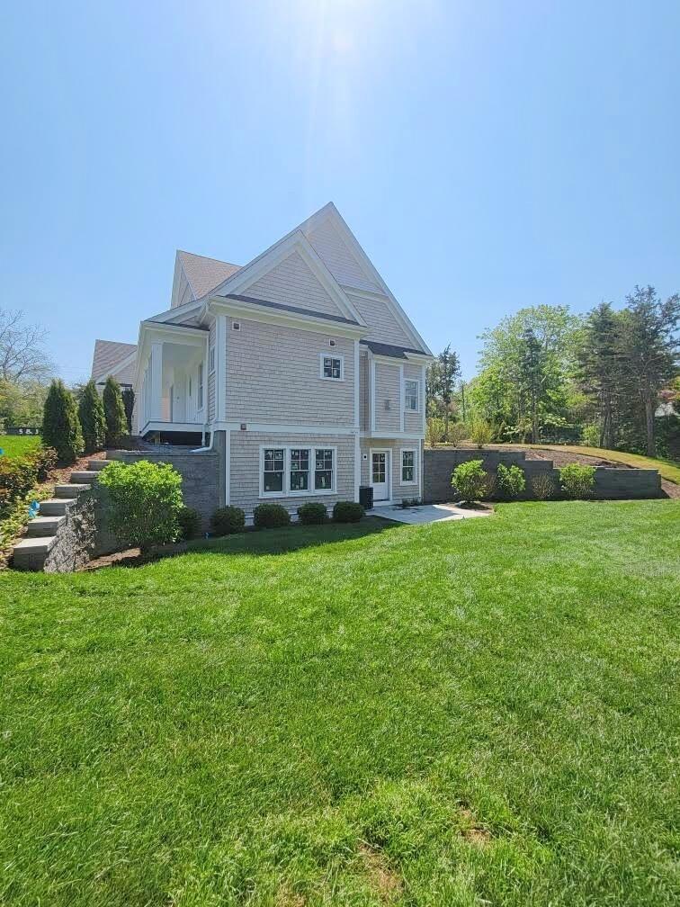 3 Snow Way Orleans, MA 02653 - Photo 30 of 33 a view of a house with backyard and garden