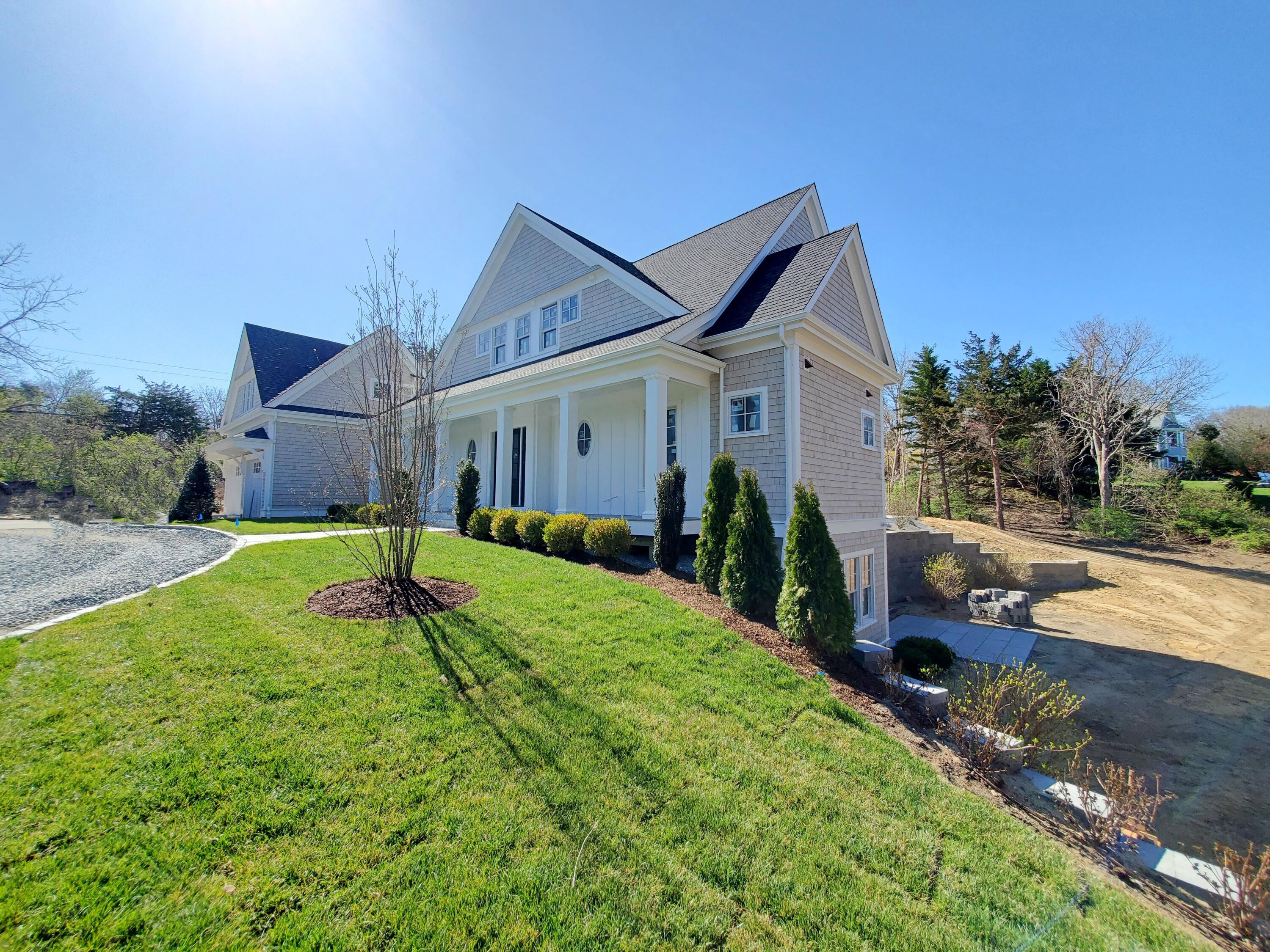 3 Snow Way Orleans, MA 02653 - Photo 5 of 33 a house view with a backyard space