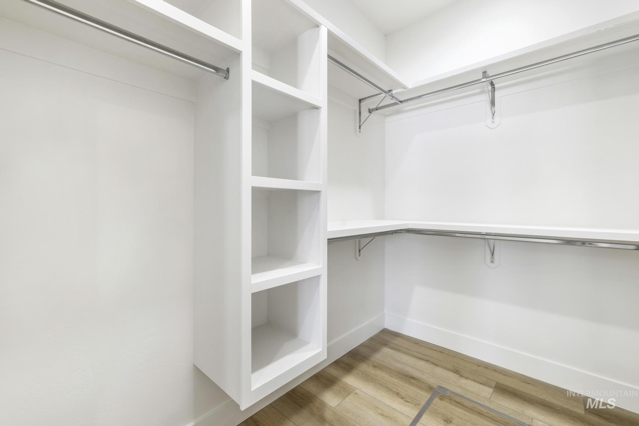 1428 Haizlee Way Twin Falls, ID 83301 - Photo 17 of 23 Walk in closet featuring light wood finished floors