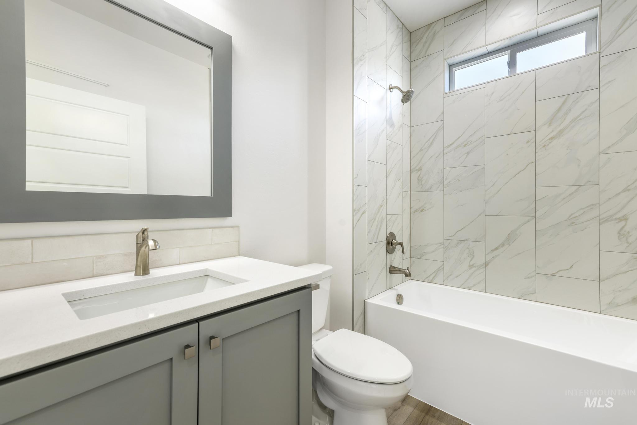 1428 Haizlee Way Twin Falls, ID 83301 - Photo 21 of 23 Full bath with shower / tub combination and vanity