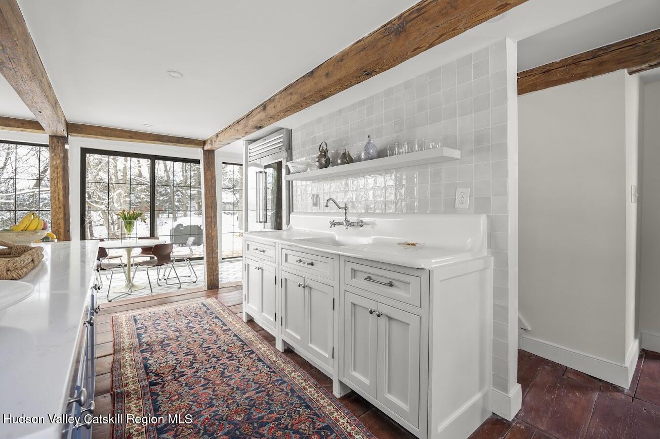 33 Broad Street Kinderhook, NY 12106 - Photo 25 of 76 23 - Kitchen view showing staircase to a