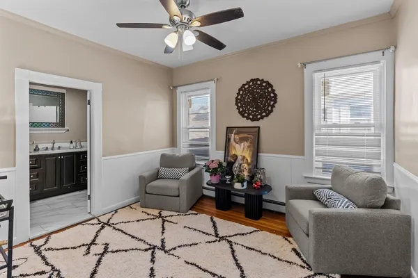 a living room with furniture and a window