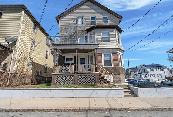 a front view of a house with a porch