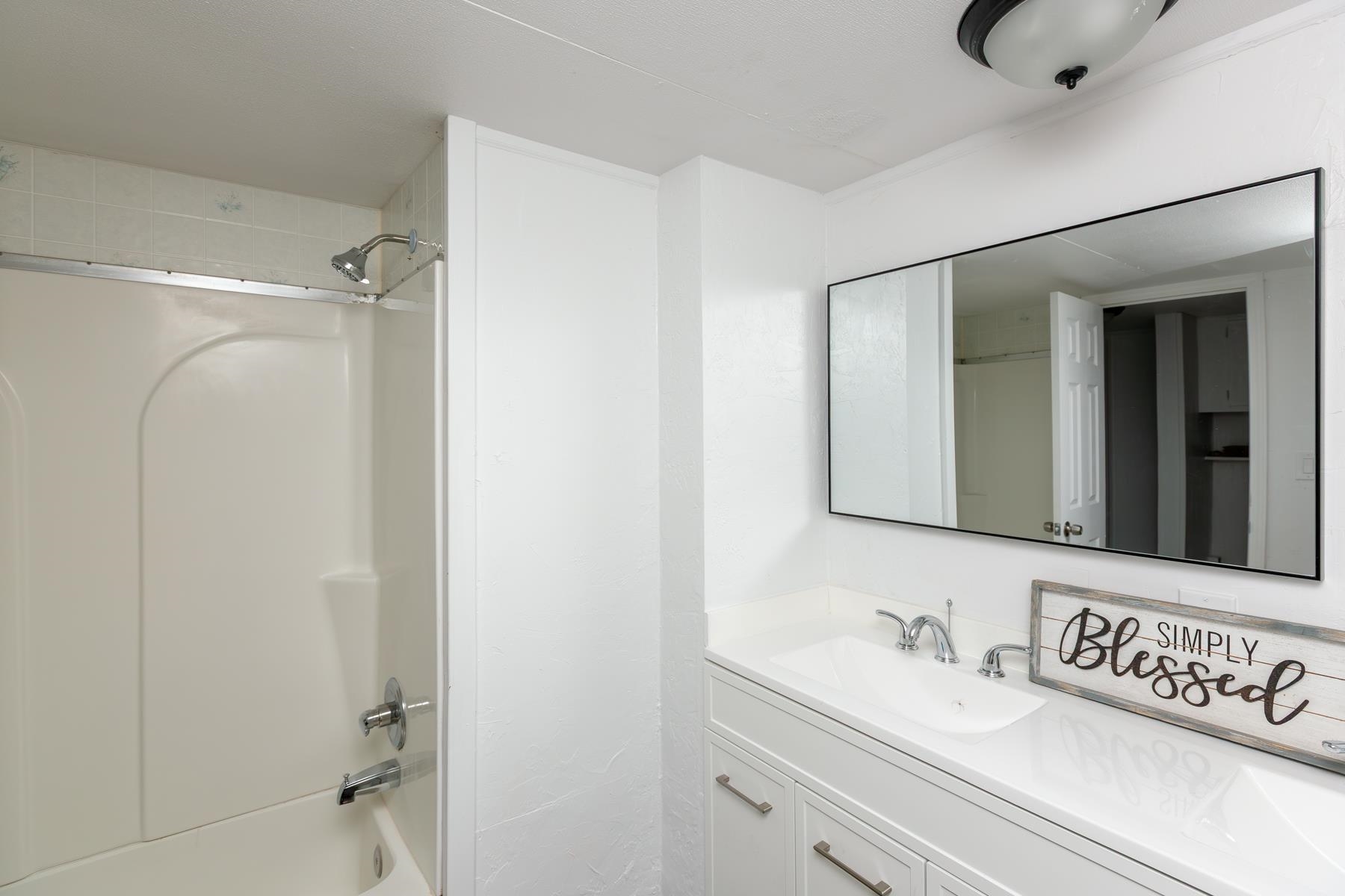 424 32 Road, Unit 112 Clifton, CO 81520 - Photo 25 of 41 a bathroom with a sink and a mirror