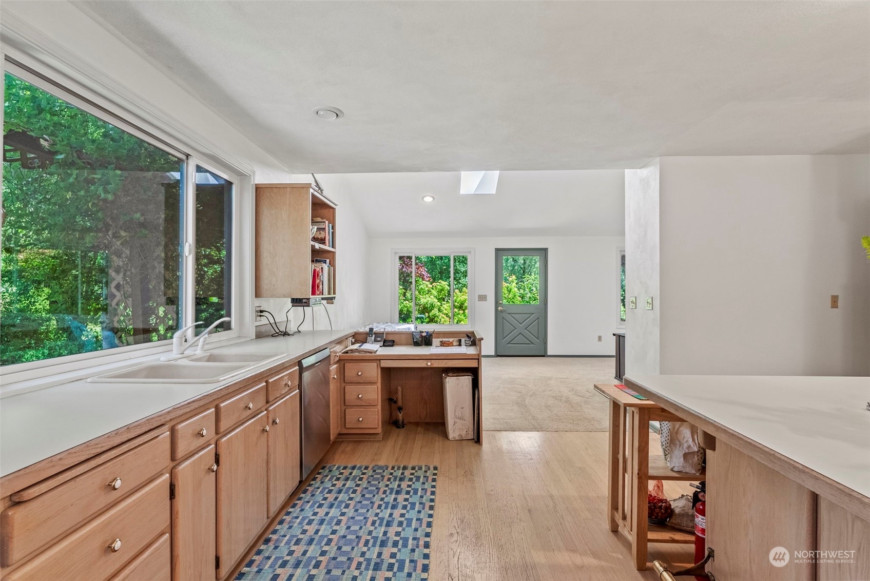 397 Deep Creek Road Chehalis, WA 98532 - Photo 13 of 34 a kitchen with a sink stove and cabinets