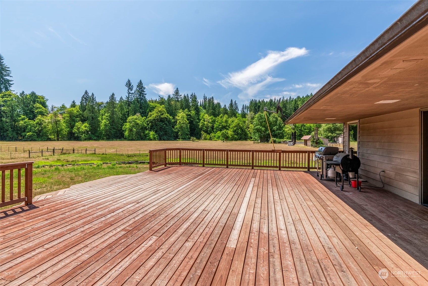 397 Deep Creek Road Chehalis, WA 98532 - Photo 18 of 34 a view of a patio with wooden floor