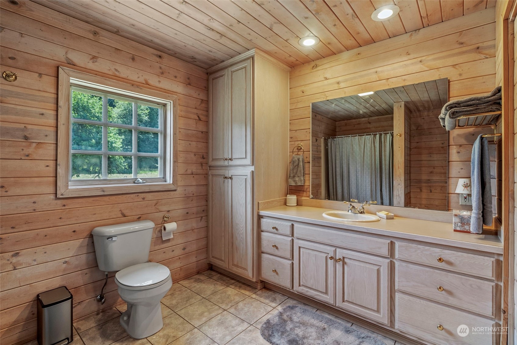 397 Deep Creek Road Chehalis, WA 98532 - Photo 22 of 34 a bathroom with a toilet sink and mirror