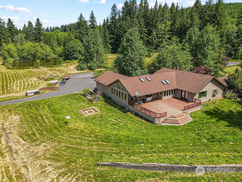 397 Deep Creek Road Chehalis, WA 98532 - Photo 3 of 34 an aerial view of a house with garden space and street view