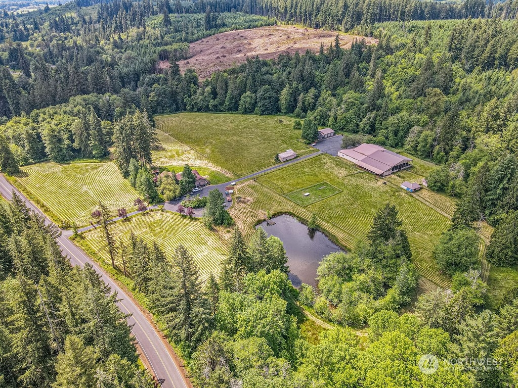 397 Deep Creek Road Chehalis, WA 98532 - Photo 31 of 34 a view of a swimming pool with a yard