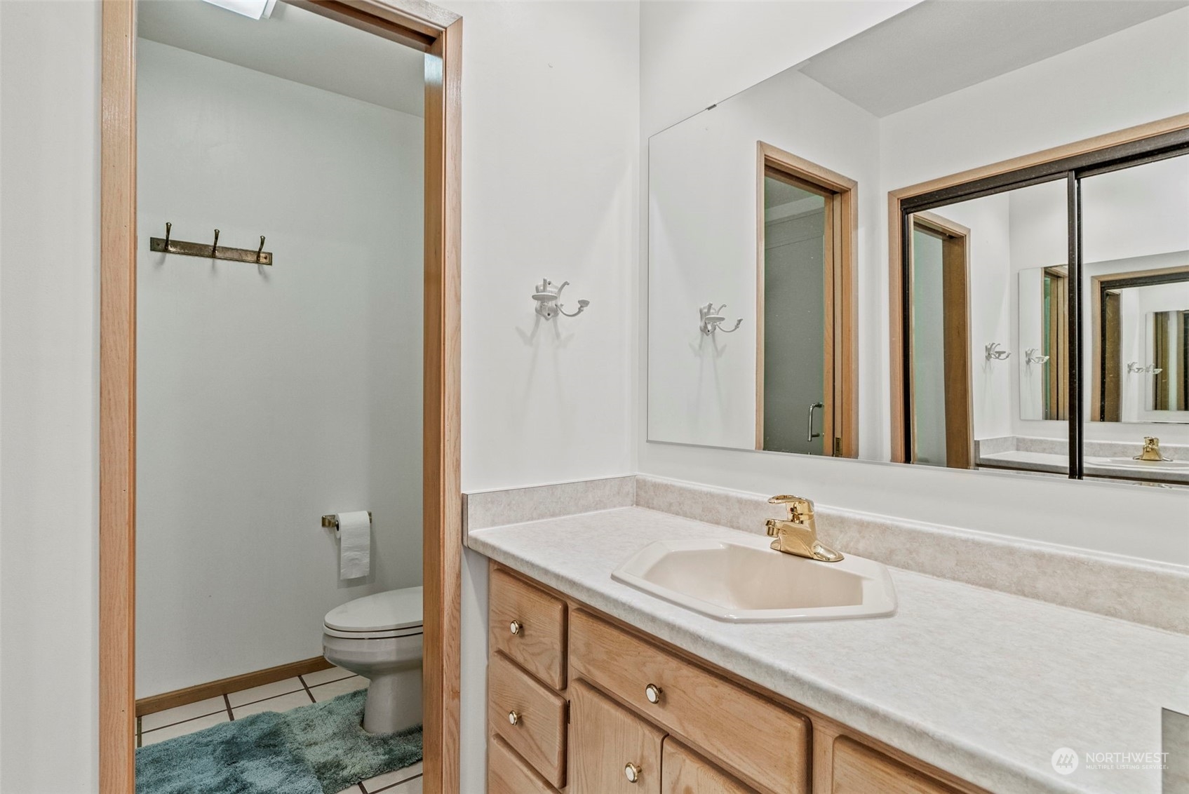397 Deep Creek Road Chehalis, WA 98532 - Photo 10 of 34 a bathroom with a granite countertop sink toilet and shower