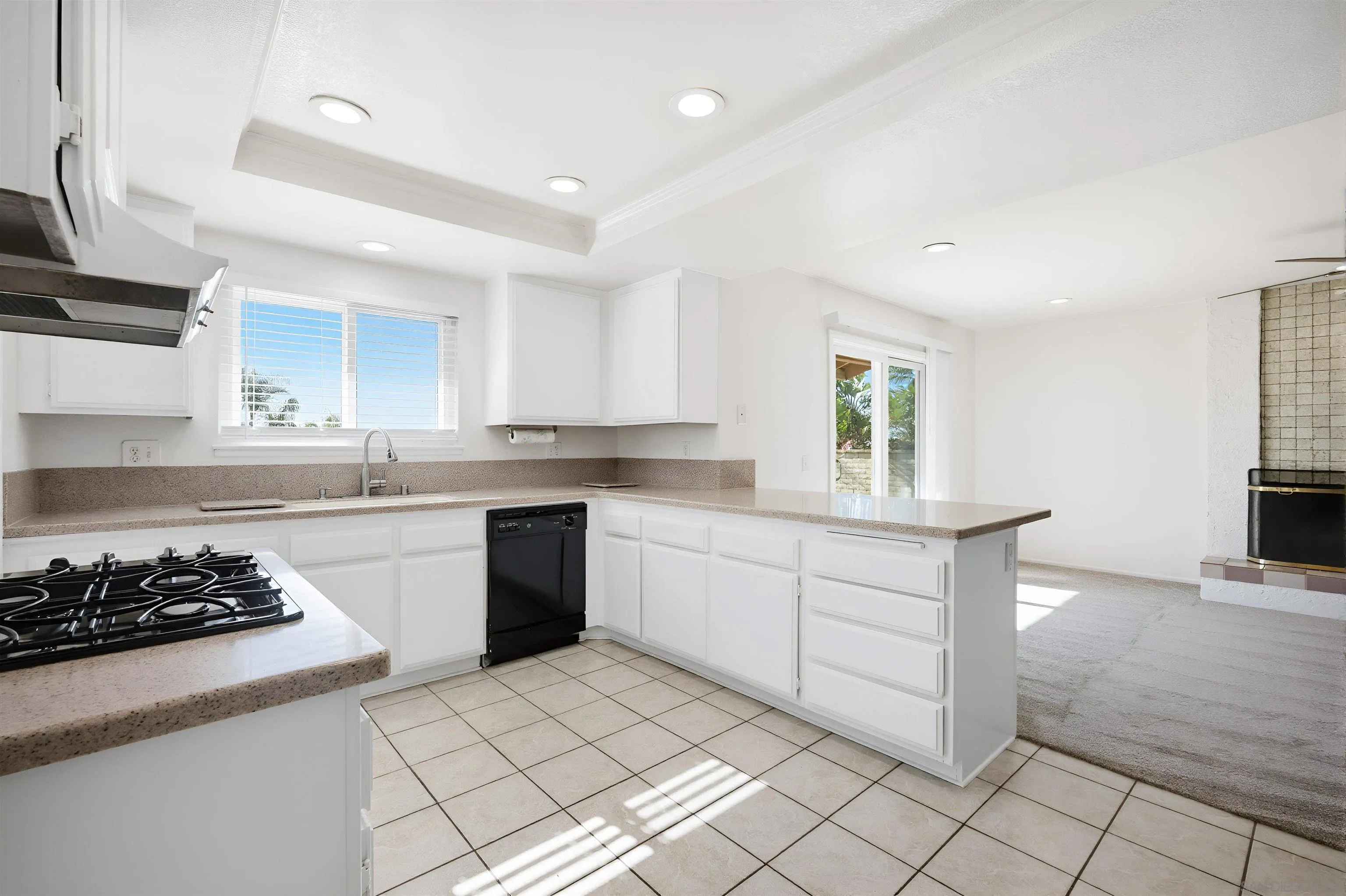 10365 Hidden Farm Road Rancho Cucamonga, CA 91737 - Photo 14 of 55 a kitchen with a sink cabinets and window