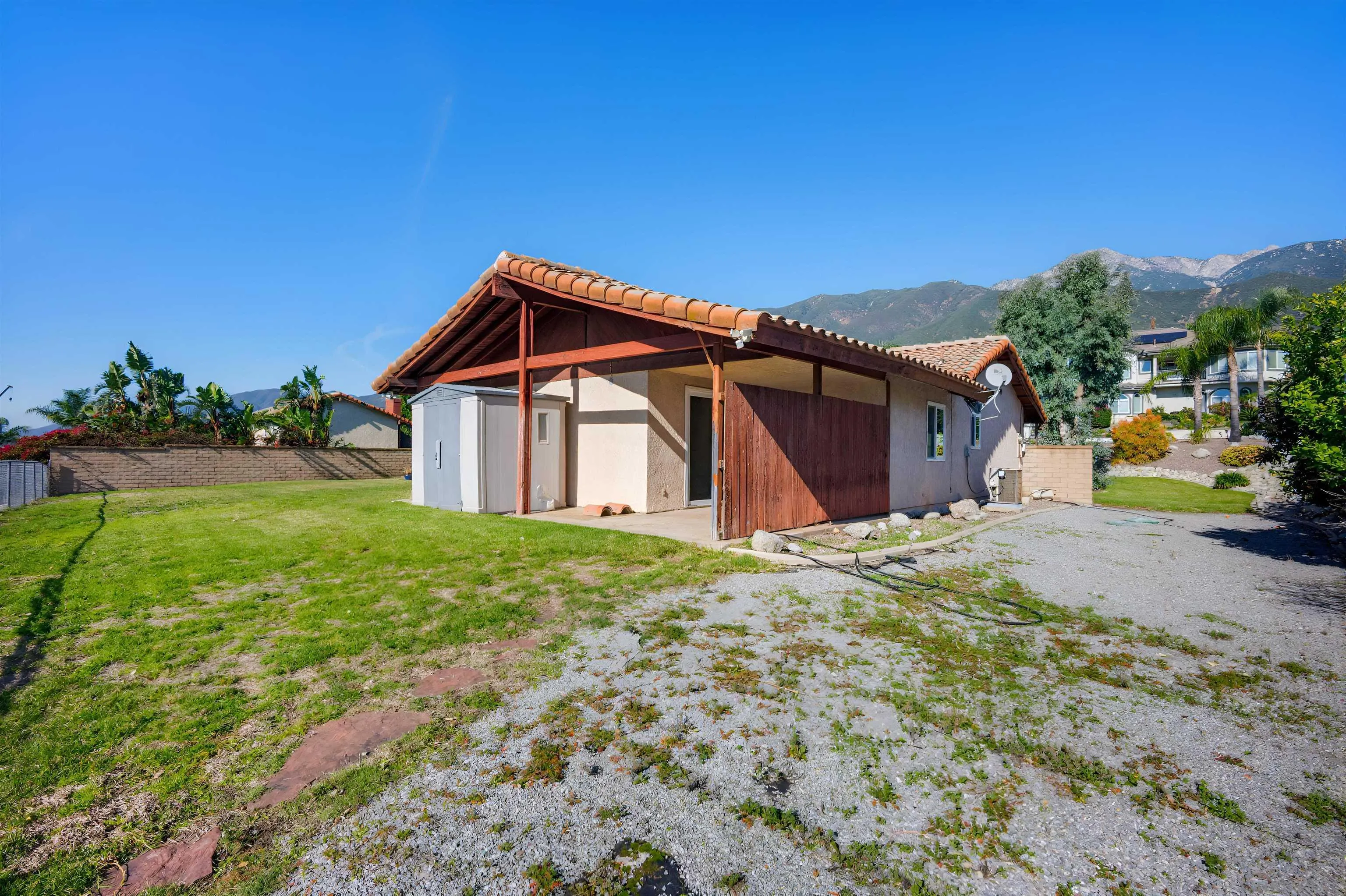 10365 Hidden Farm Road Rancho Cucamonga, CA 91737 - Photo 49 of 55 a view of a house with backyard and garden