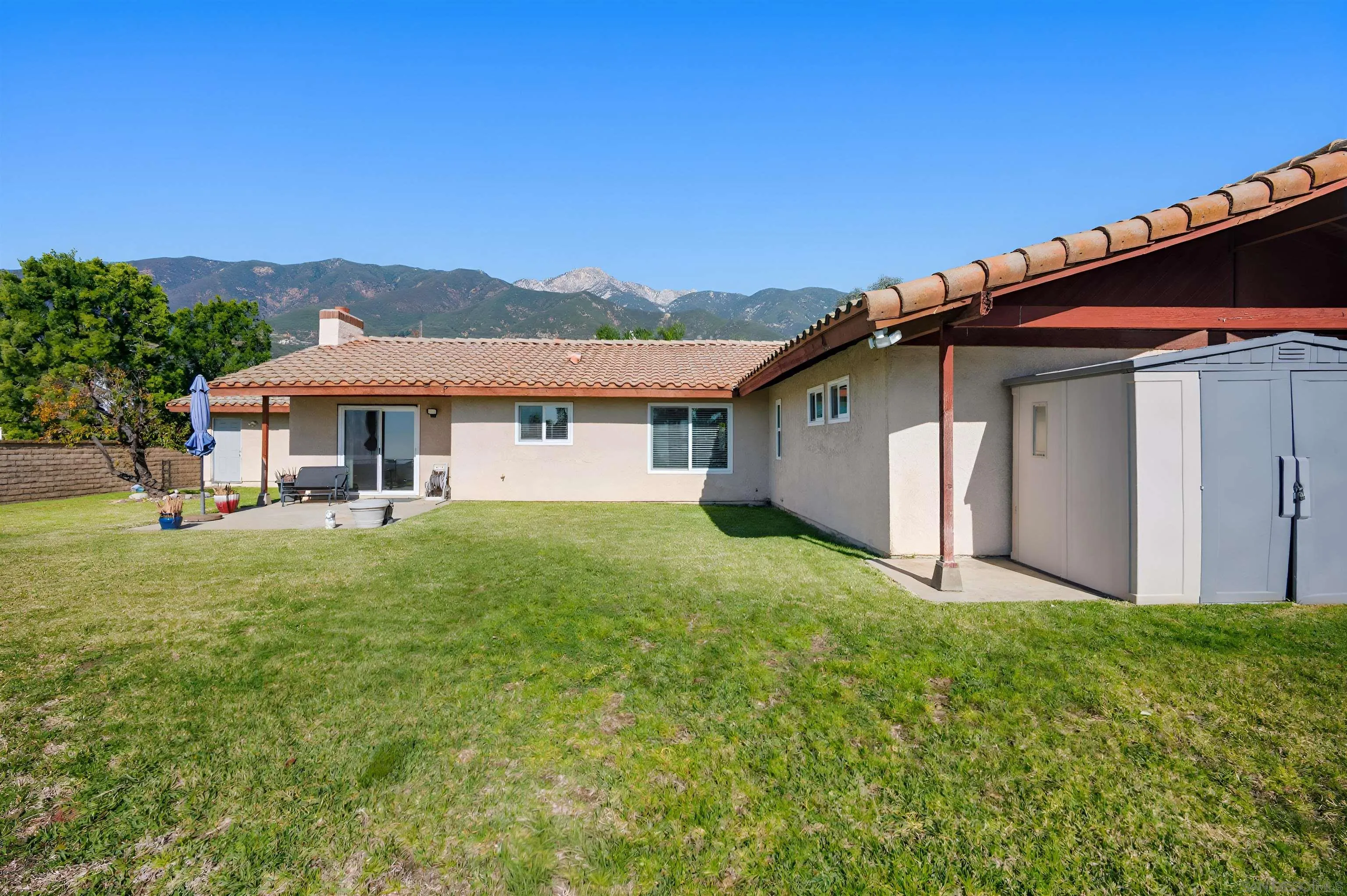 10365 Hidden Farm Road Rancho Cucamonga, CA 91737 - Photo 50 of 55 a view of a house with backyard and garden