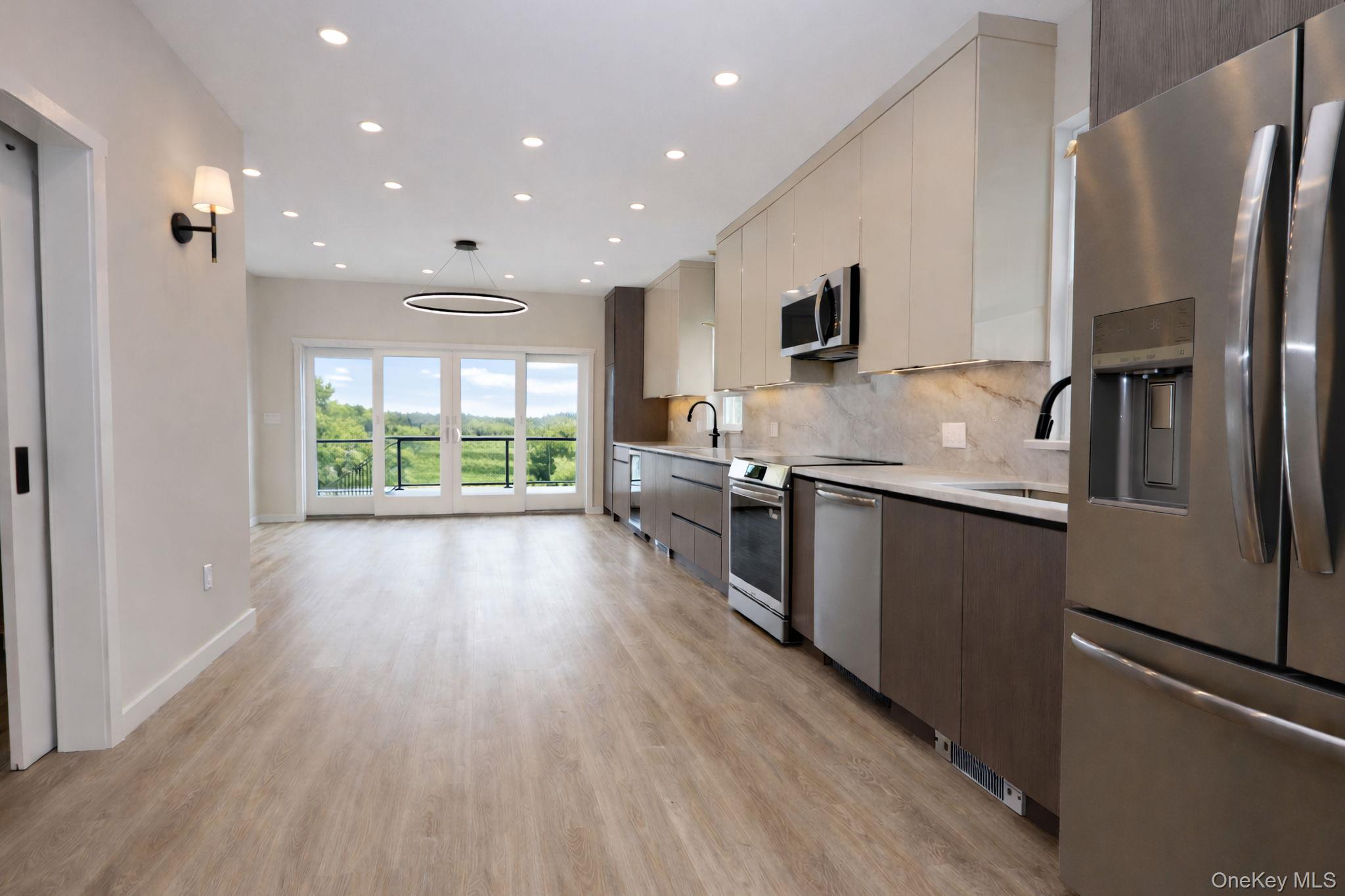 52 Roe Avenue Highland Falls, NY 10928 - Photo 6 of 22 Open concept eat in kitchen and living room