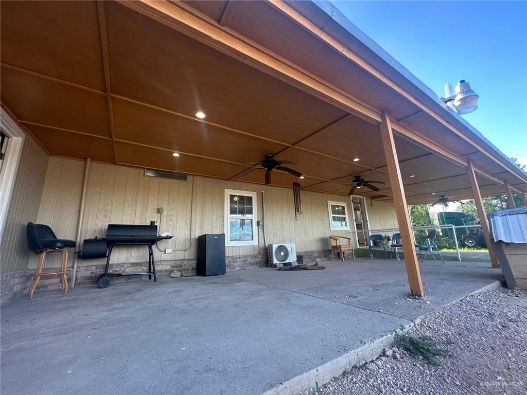 8115 North Brushline Road Mission, TX 78574 - Photo 1 of 1 View of vehicle parking with ceiling fan