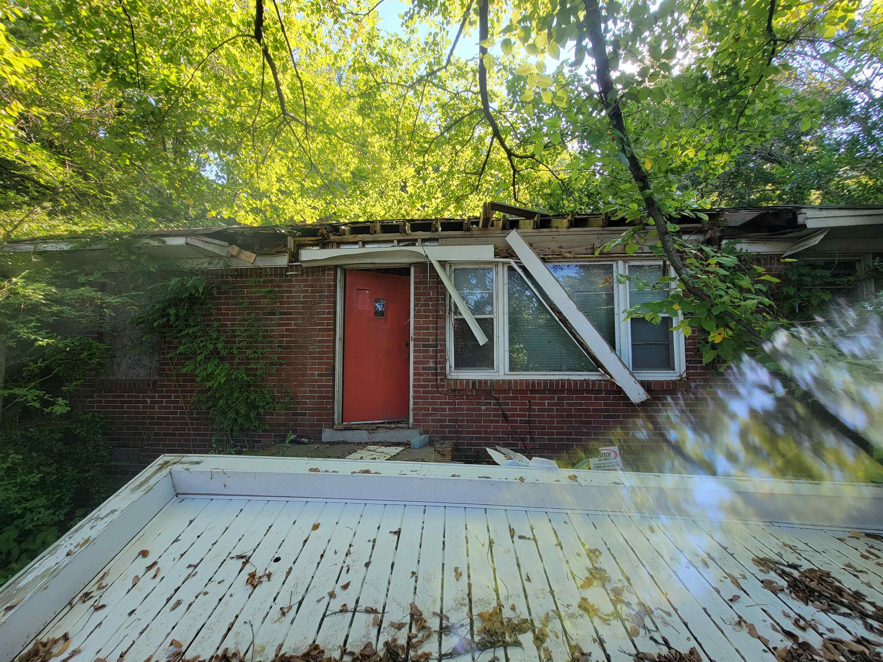 2840 Range Line Road Memphis, TN 38127 - Photo 1 of 5 a view of backyard of house with green space