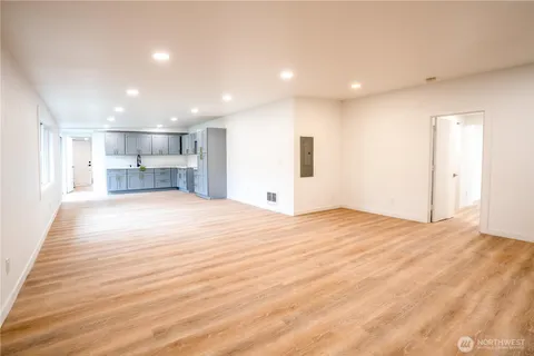 a view of a kitchen and a window