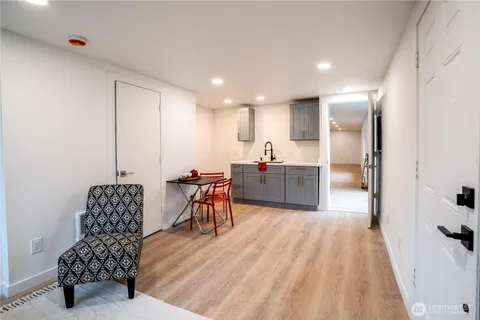 a living room with furniture and a table