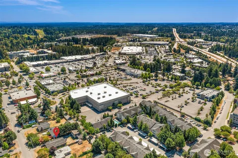 an aerial view of residential building and parking space