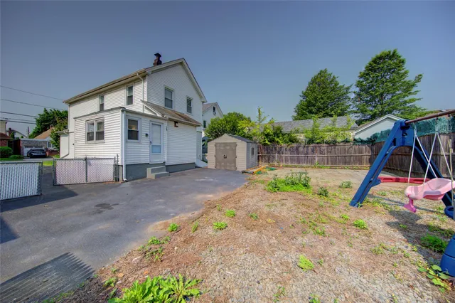 a view of a house with a park