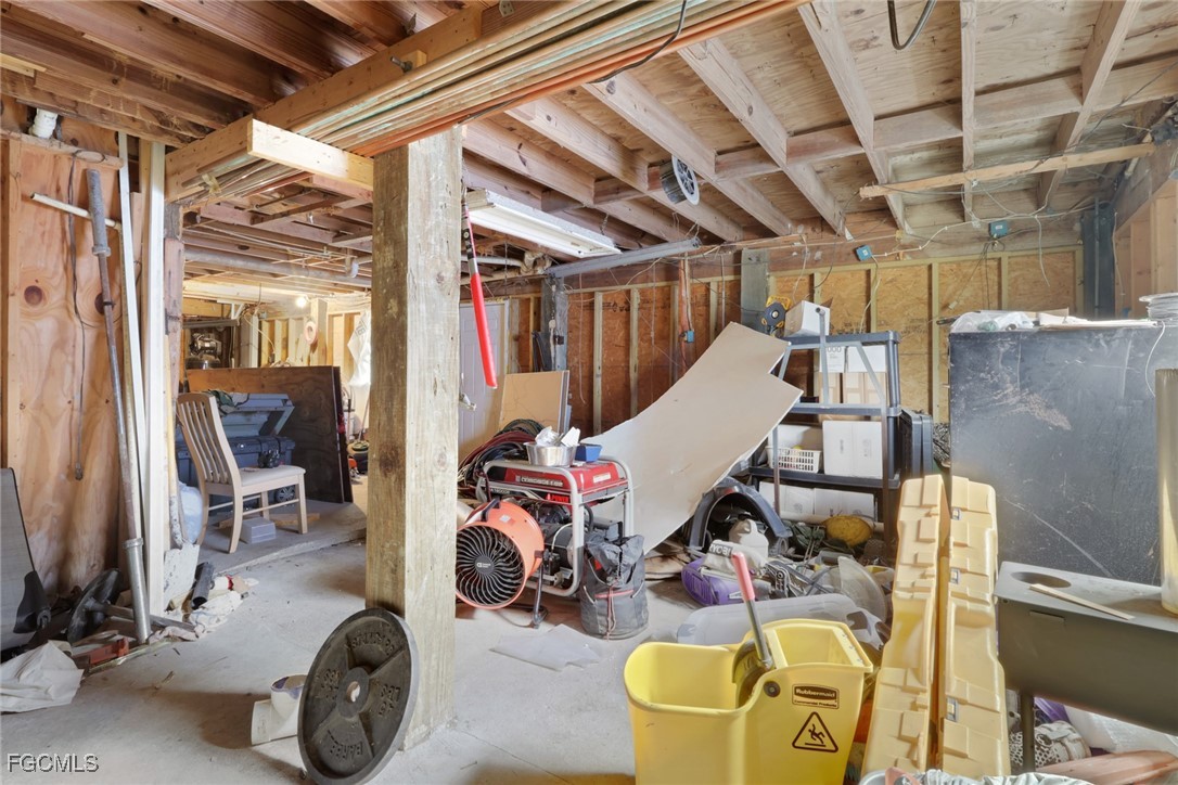 1506 Rena Avenue South Lehigh Acres, FL 33976 - Photo 26 of 39 a view of a room with gym equipment