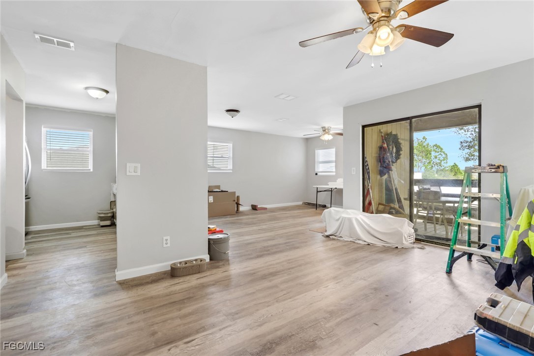 1506 Rena Avenue South Lehigh Acres, FL 33976 - Photo 6 of 39 a bedroom with furniture and a window