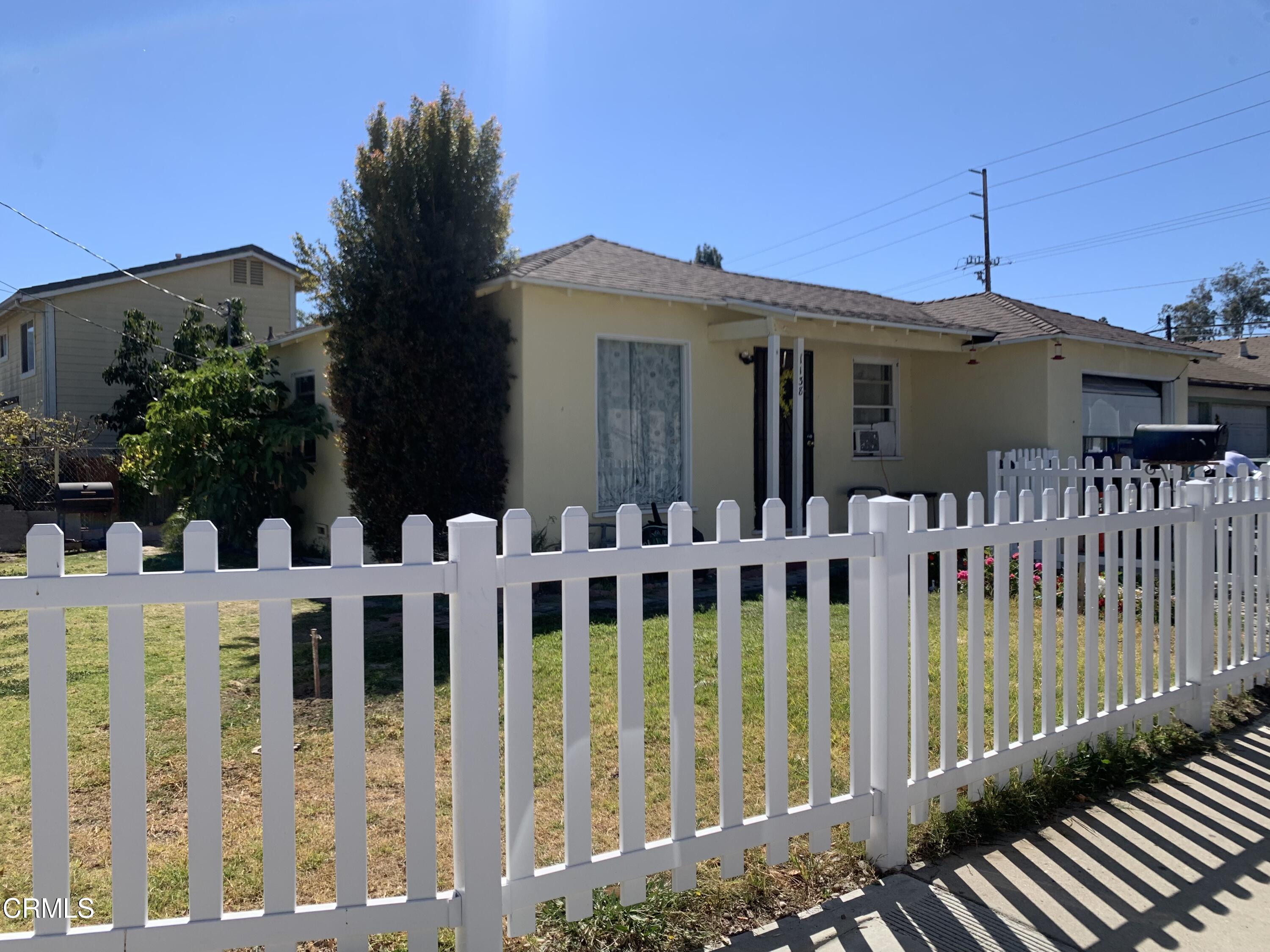 1138 Richmond Road Santa Paula, CA 93060 - Photo 2 of 2 a view of a house with wooden fence