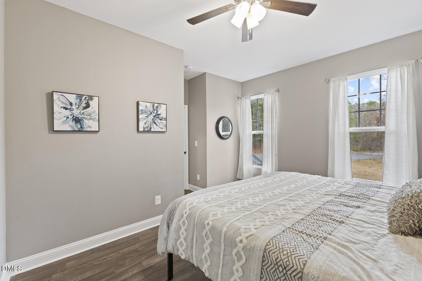 1021 Coley Road Raleigh, NC 27613 - Photo 17 of 42 a bedroom with a large bed and a window