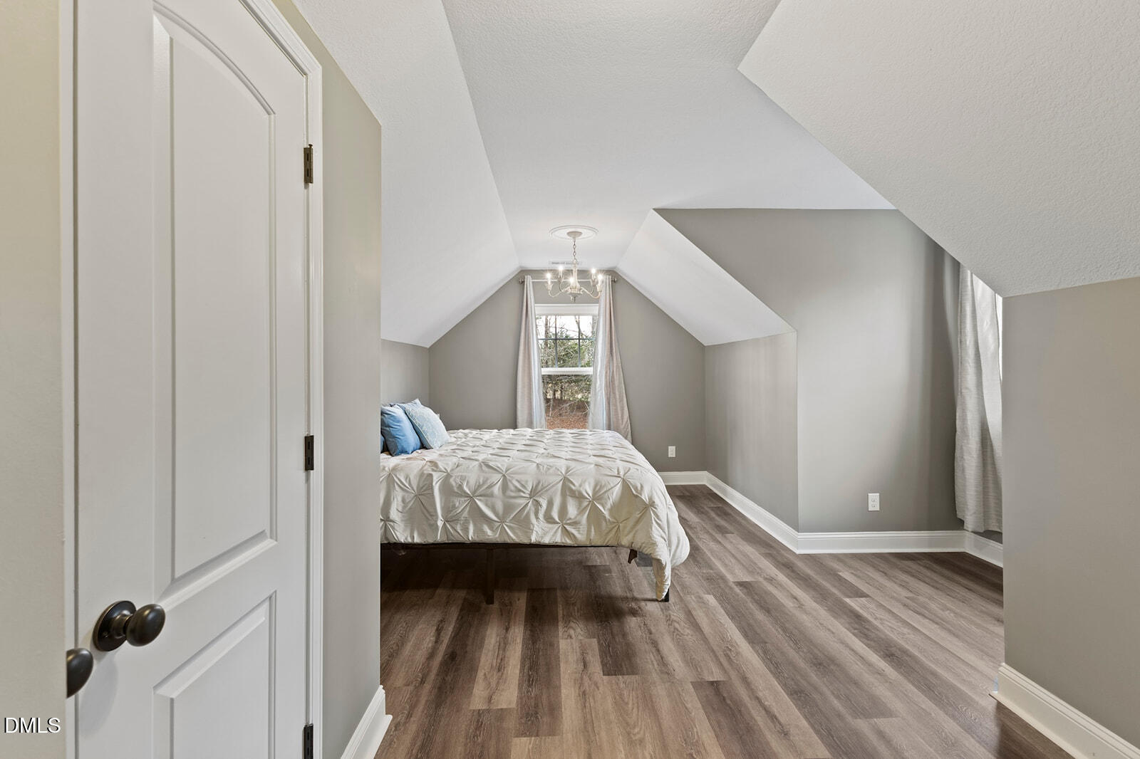 1021 Coley Road Raleigh, NC 27613 - Photo 28 of 42 a bed room with a bed and a window