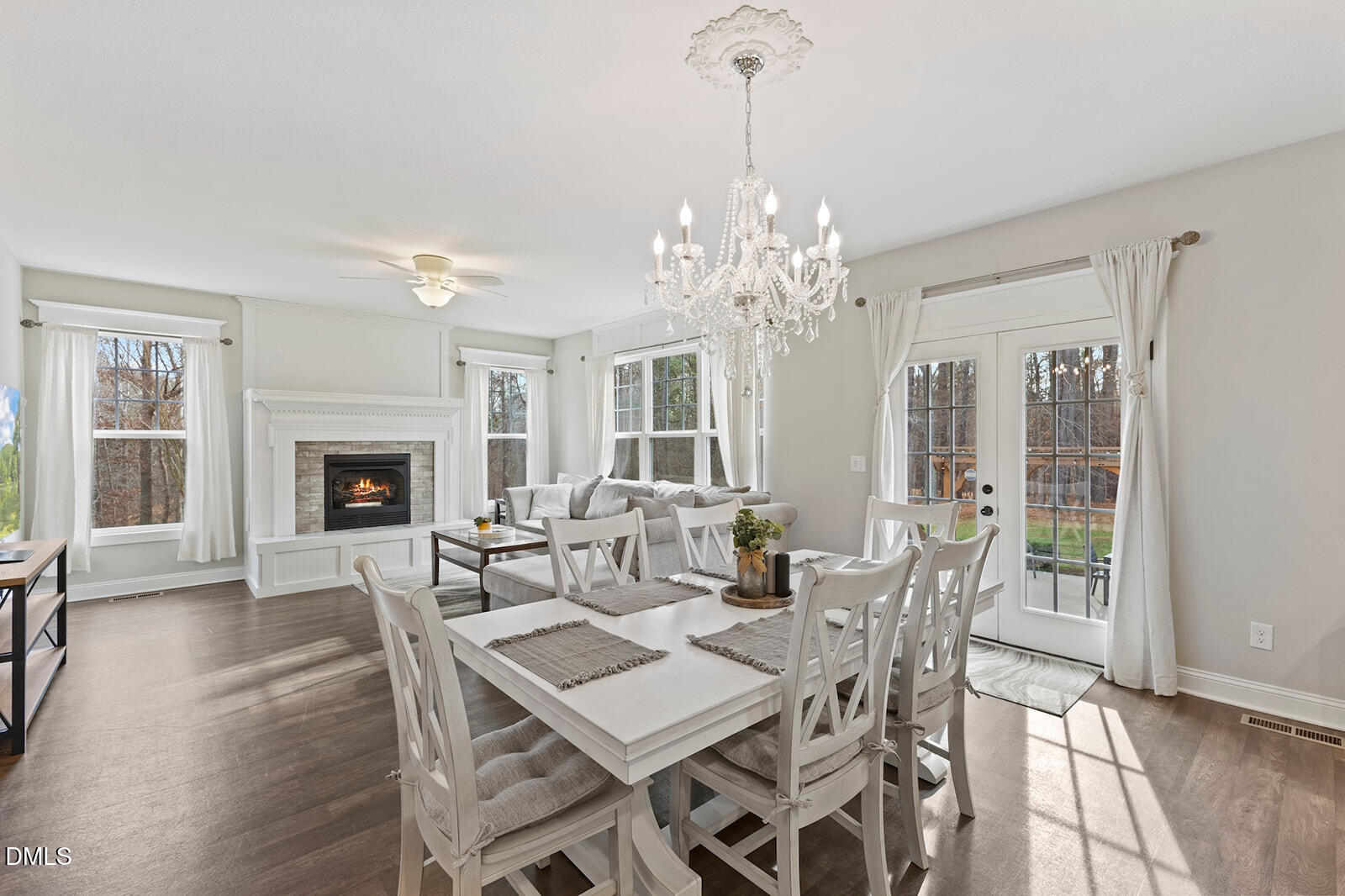 1021 Coley Road Raleigh, NC 27613 - Photo 2 of 42 a view of a dining room with furniture wooden floor and chandelier