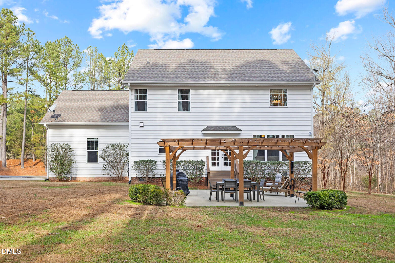 1021 Coley Road Raleigh, NC 27613 - Photo 31 of 42 a view of house with outdoor space and sitting area