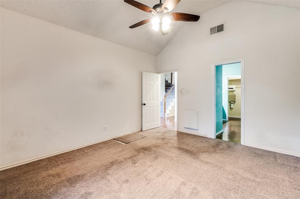 3902 Amy Court Arlington, TX 76016 - Photo 12 of 26 Primary bedroom on the first floor, with ensuite