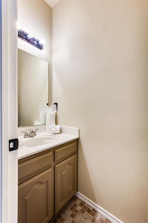 3902 Amy Court Arlington, TX 76016 - Photo 6 of 26 Half Bathroom downstairs