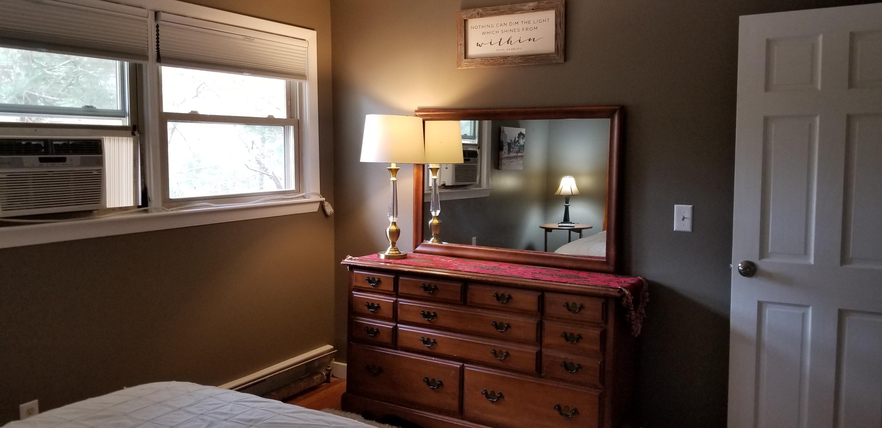 628 County Road Pocasset, MA 02559 - Photo 15 of 21 a bathroom with a sink a mirror and a window