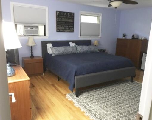 628 County Road Pocasset, MA 02559 - Photo 10 of 21 a bedroom with a bed and window