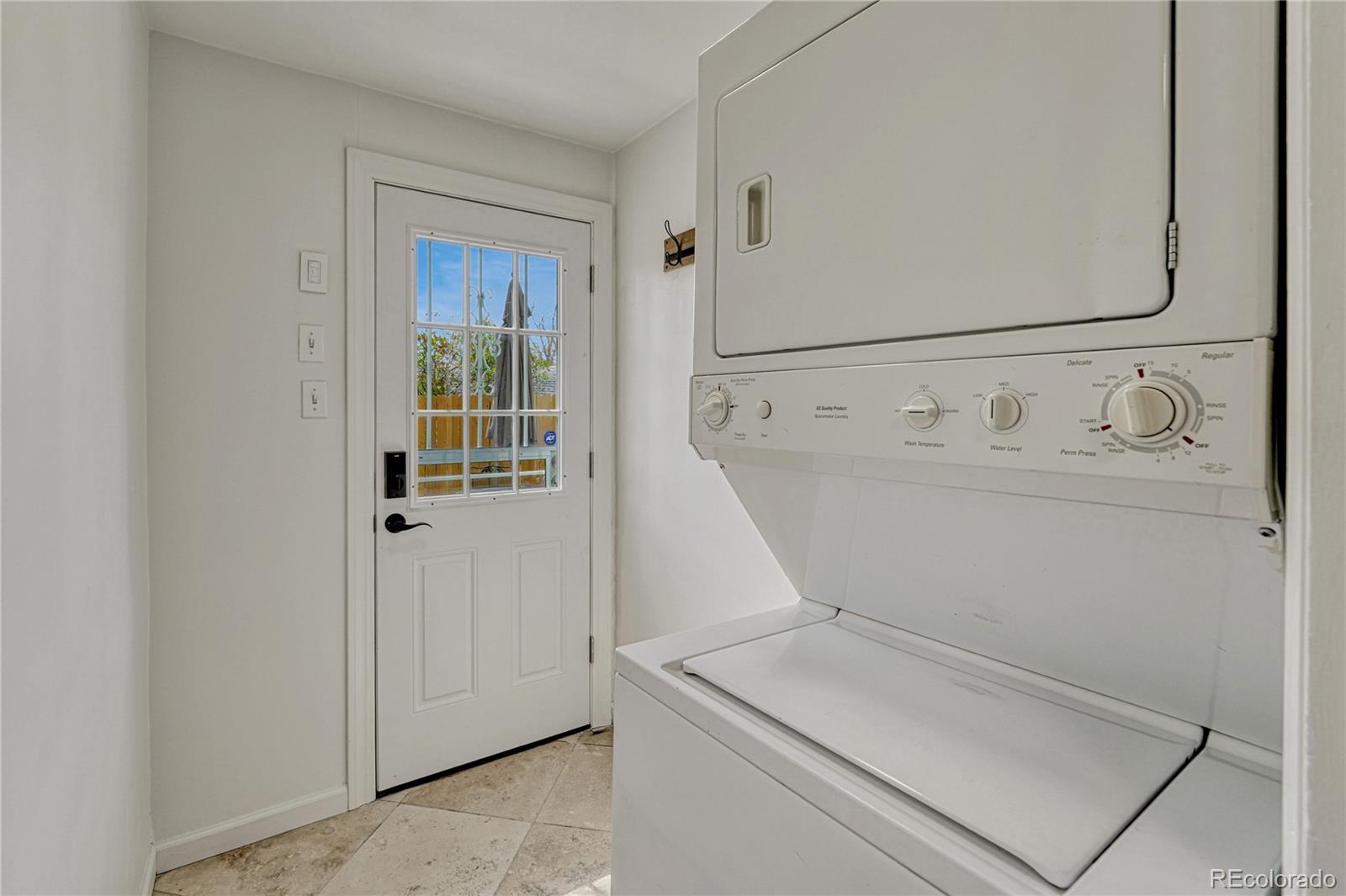 1111 South Perry Street Denver, CO 80219 - Photo 10 of 23 a utility room with dryer and washer