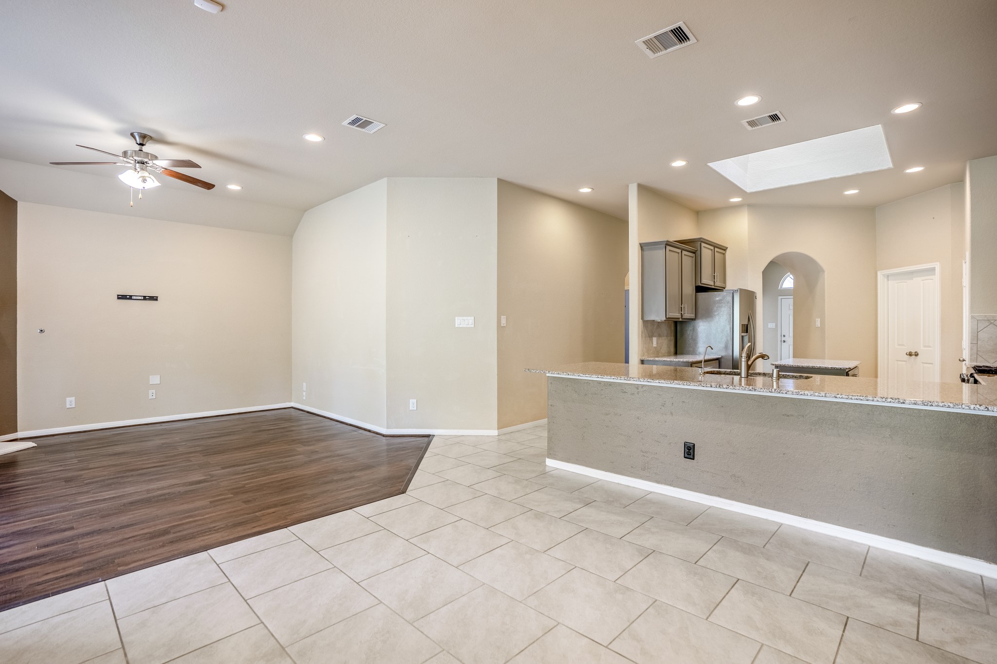 5319 Claymore Meadow Lane Spring, TX 77389 - Photo 33 of 34 a spacious bathroom with a granite countertop sink a mirror and shower