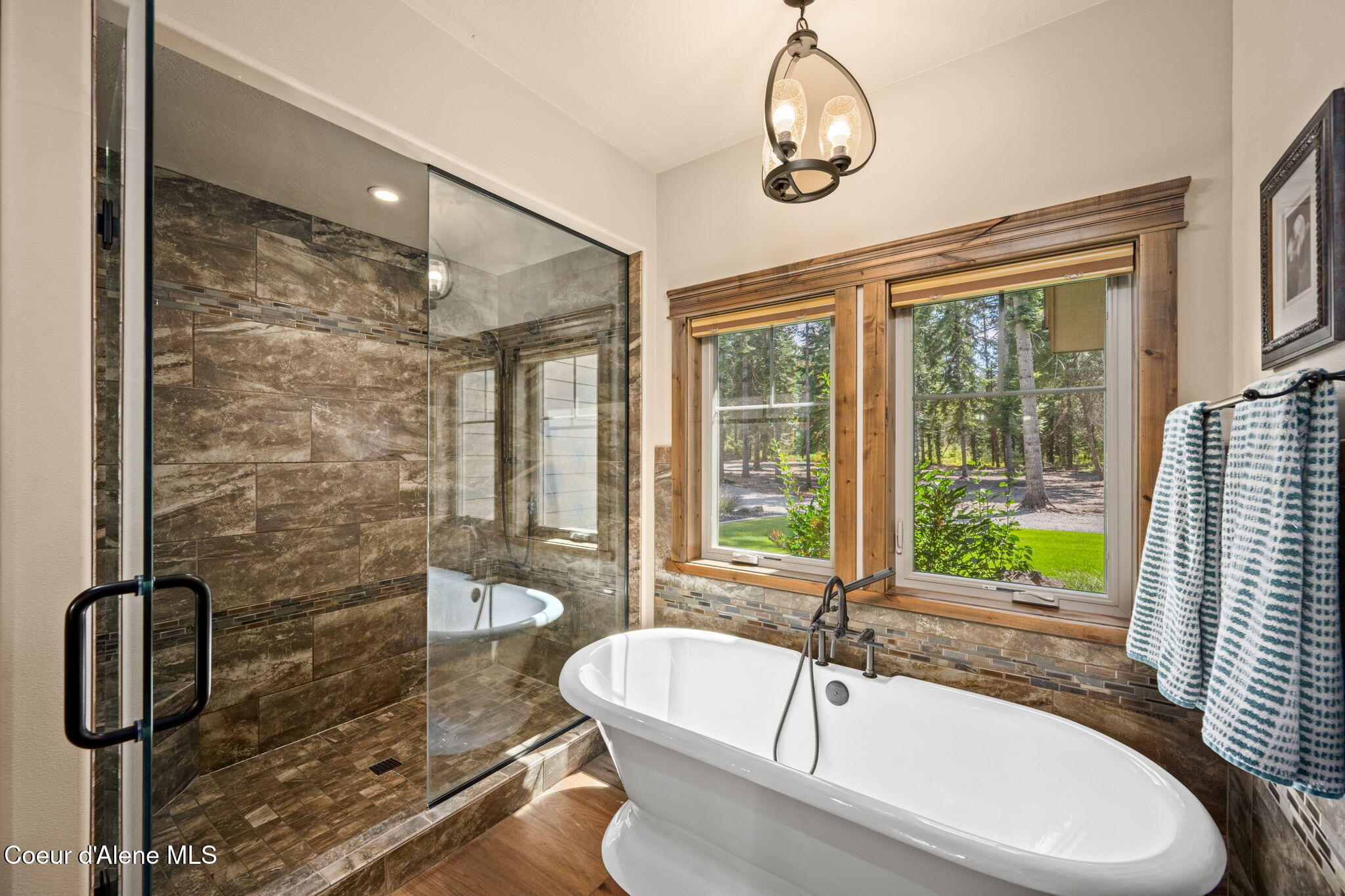 1609 East Amulet Circle Rathdrum, ID 83858 - Photo 22 of 68 Mud set tile shower is a work of art