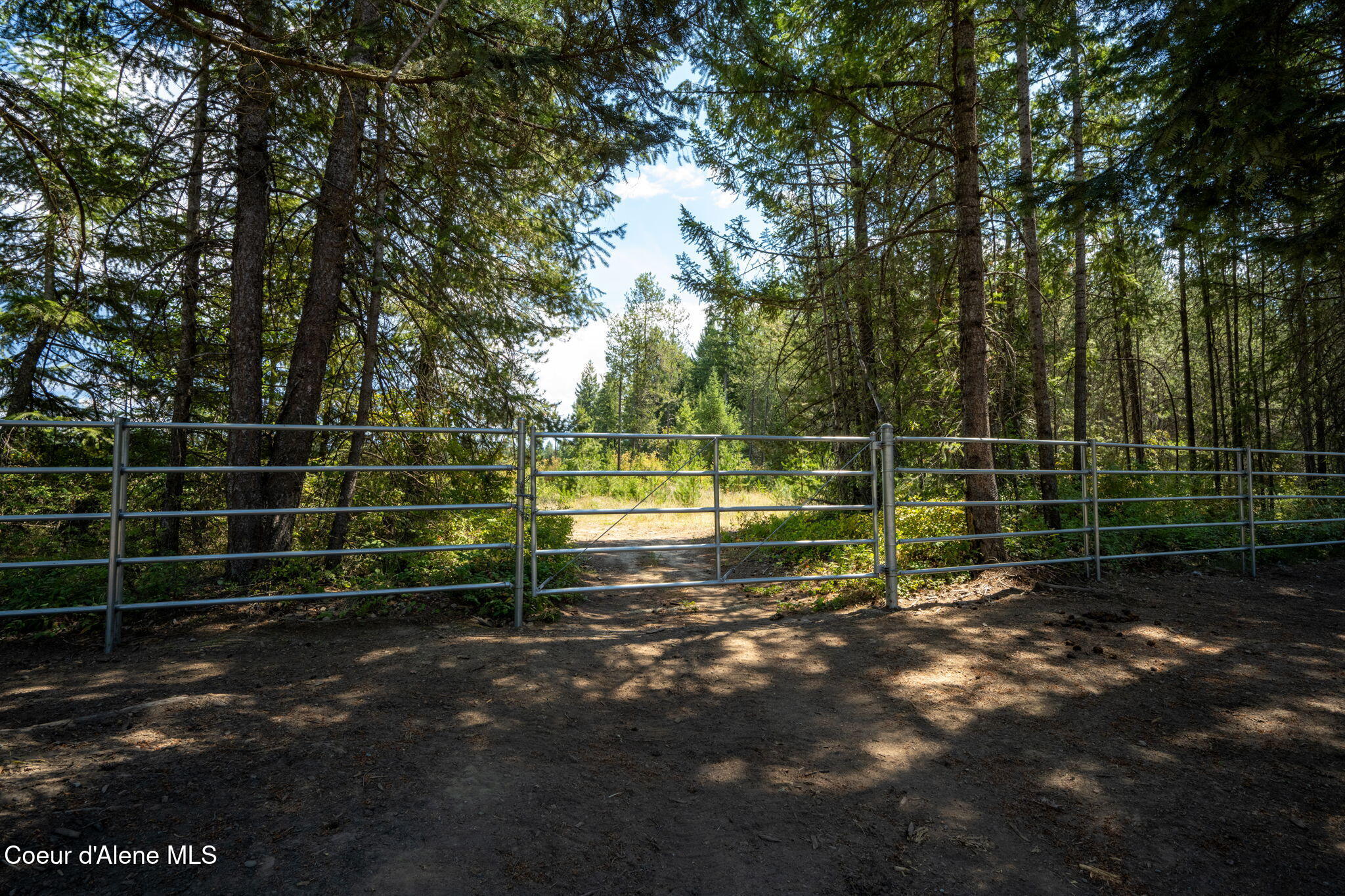 1609 East Amulet Circle Rathdrum, ID 83858 - Photo 53 of 68 Corral is 5 rail galvanized pipe fencing