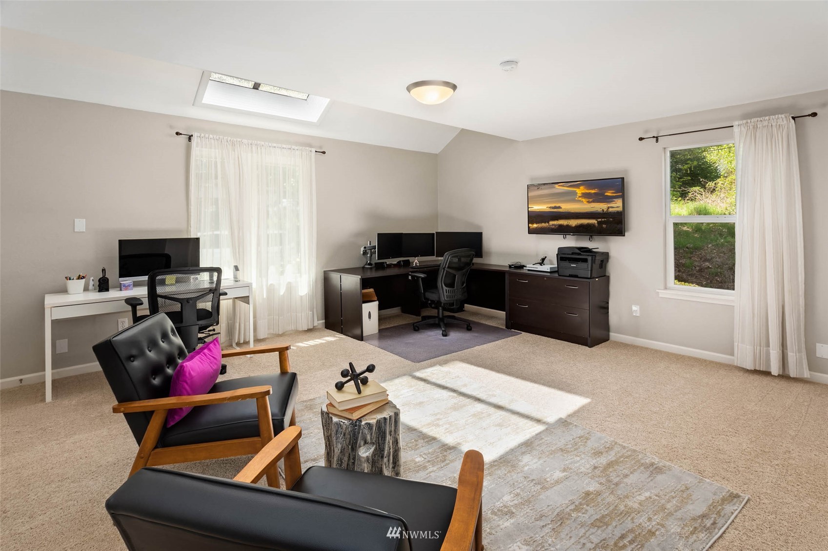 314 171st Street Southeast Bothell, WA 98012 - Photo 13 of 36 a living room with furniture gym equipment and a window