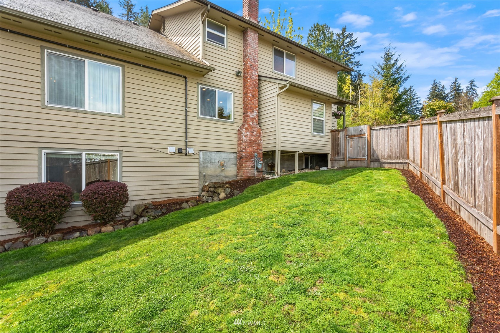 314 171st Street Southeast Bothell, WA 98012 - Photo 34 of 36 a view of a house with a yard and a large tree