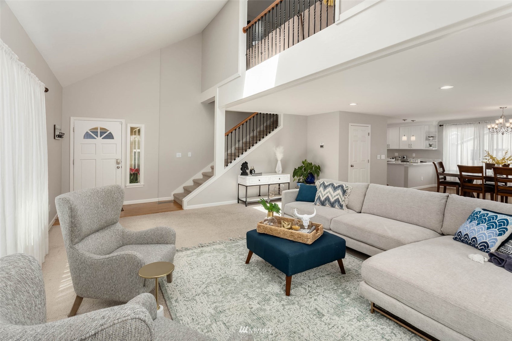 314 171st Street Southeast Bothell, WA 98012 - Photo 5 of 36 a living room with furniture and a view of kitchen