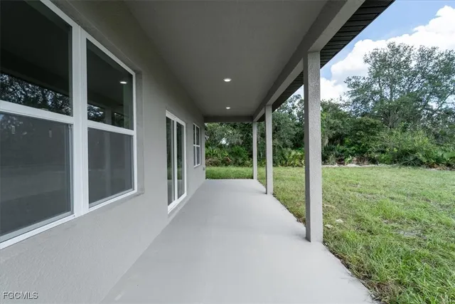 a view of a garden with an outdoor space