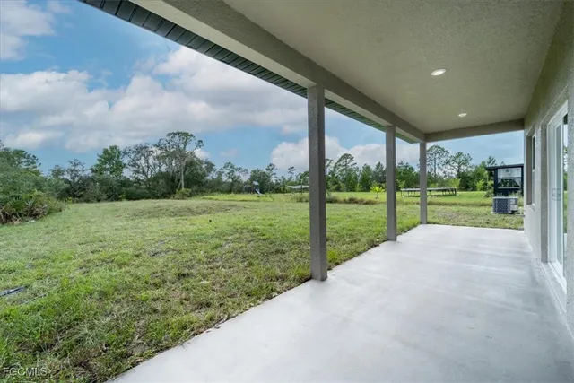 a house with trees in front of it