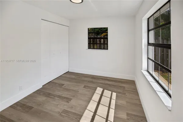 an empty room with windows
