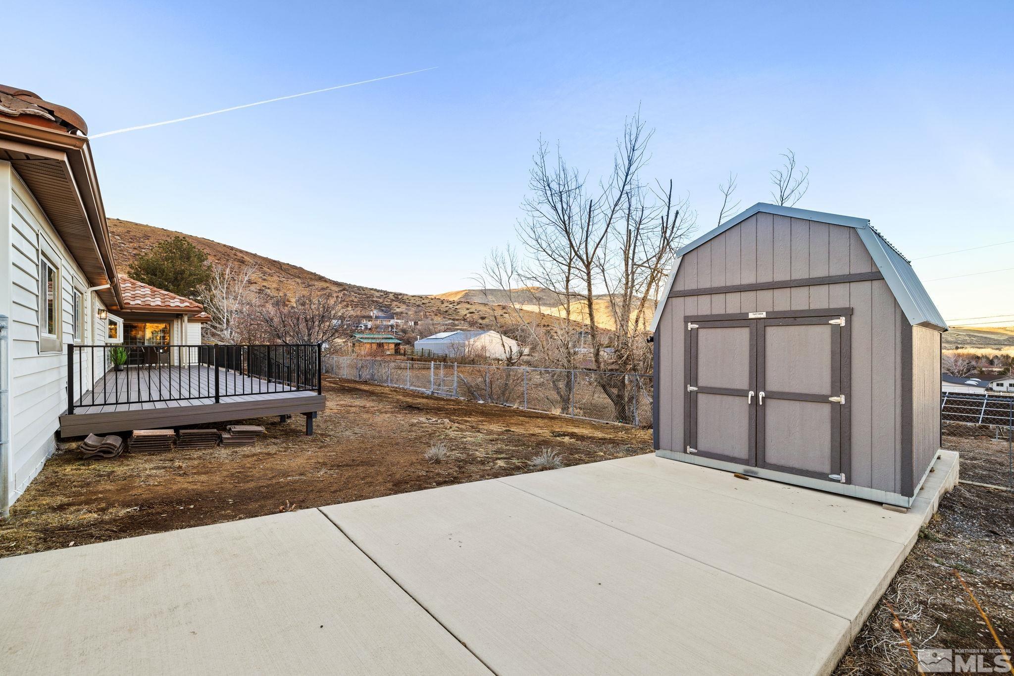 175 Del Mesa Circle Reno, NV 89521 - Photo 34 of 35 a view of a house with a snow in a yard