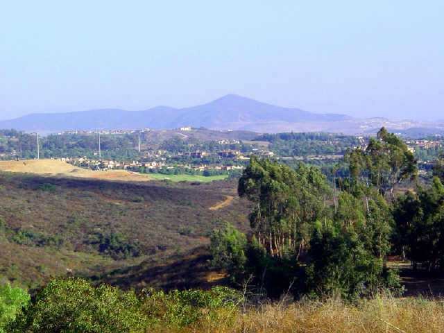 1637 Rancho Summit Drive Encinitas, CA 92024 - Photo 1 of 1 a view of a lake with a mountain