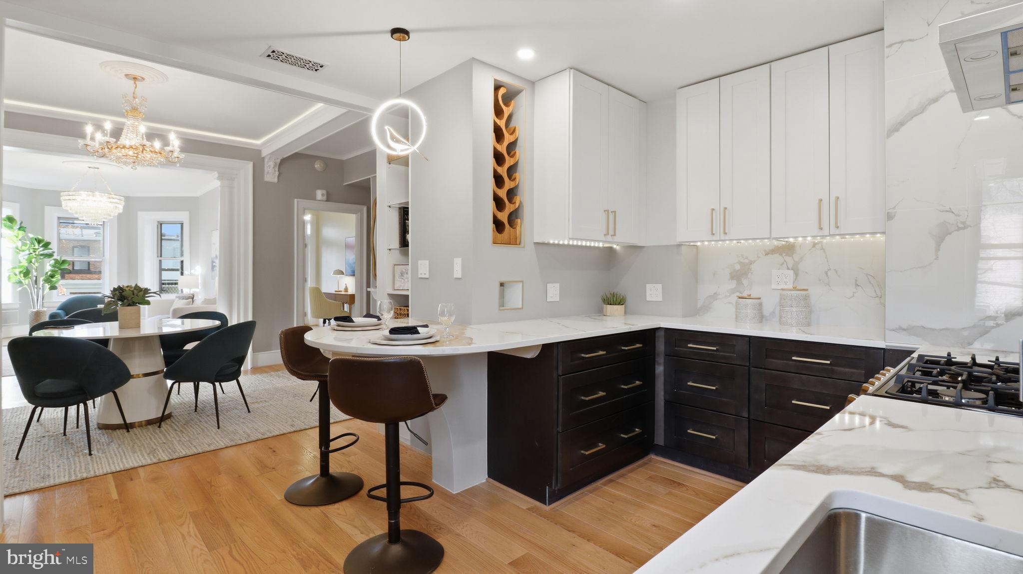 2205 California Street Northwest, Unit 303 Washington, DC 20008 - Photo 1 of 52 a kitchen with a cabinets and chairs